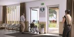 Sistema de puertas batientes, referencia SW200 I de ASSA ABLOY. Sin brazo visible y motor integrado